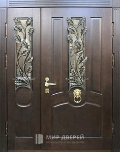 Парадная дверь с художественной ковкой №112 внешняя - фото